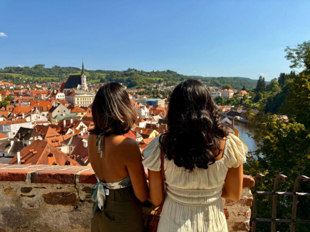 Two ladies looking at the view from the 5th courtyard