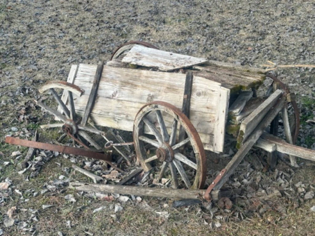 An old abandoned wagon on the ground