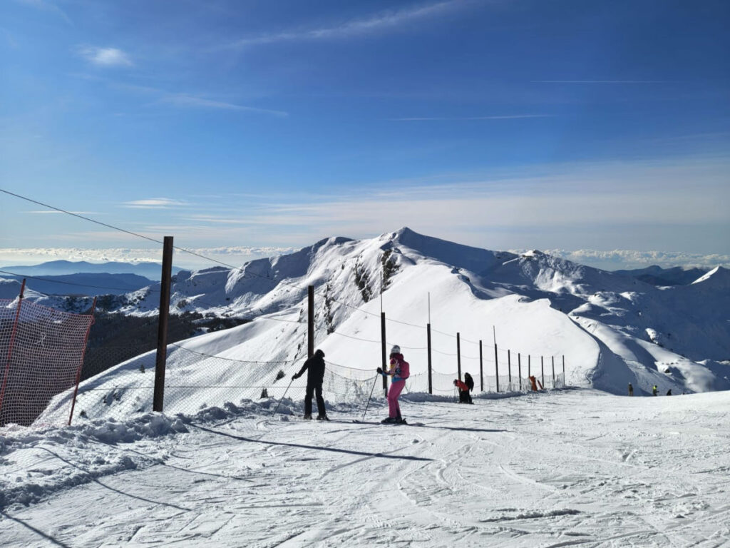 Skiers at Abetone Mountain