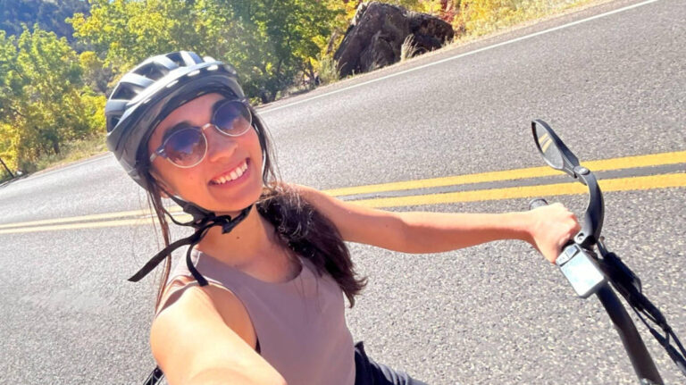 Travel Lemming editor Abigail Bliss, riding a bike in Zion National Park
