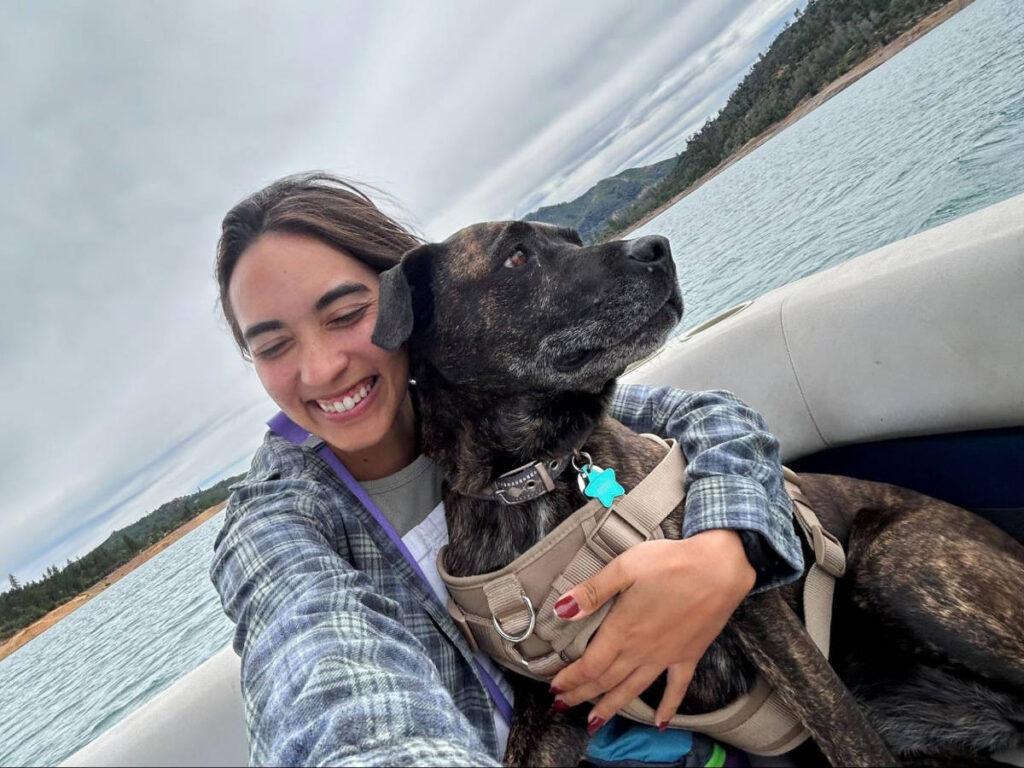 The author, Abigail Bliss with her dog in Lake Shasta