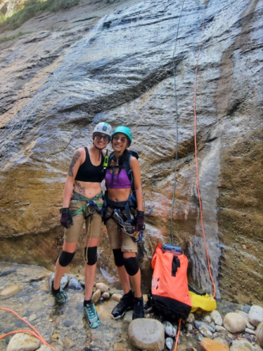 Travel Lemming Editor Abigail Bliss and her friend canyoneering in Zion National Park