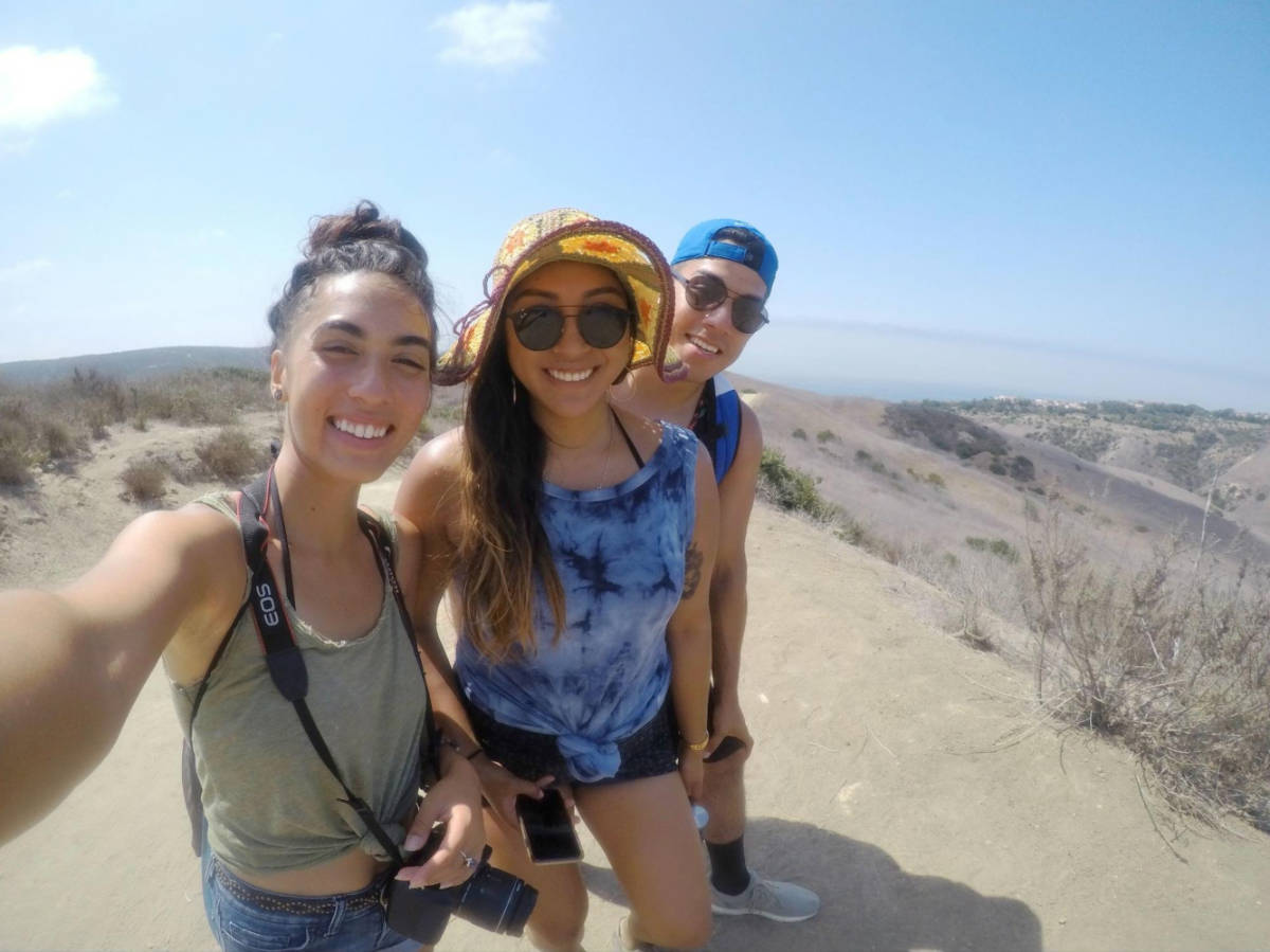 Travel Lemming author Abigail Bliss and her friends hiking at Crystal Cove State Park