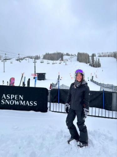 The author Abigail Bliss, standing near the ski area at Aspen Snowmass