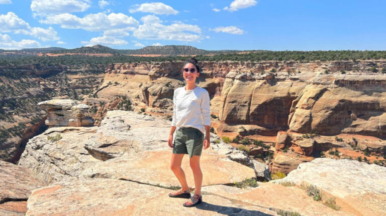 Travel Lemming Editor Abigail Bliss posing for a photo at the Colorado National Monument