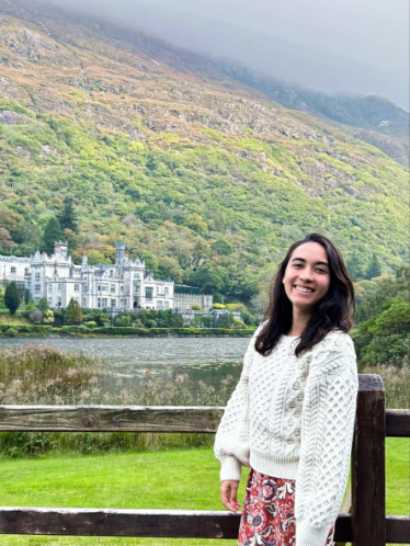 The author Abigail Bliss wearing her Aran sweater at Kylemore Abbey