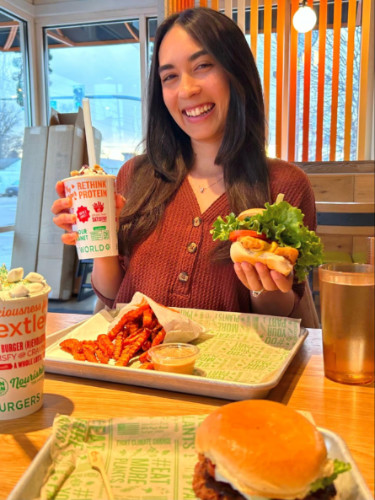 Editor Abigail enjoying her orders at Next Level Veggie Grill