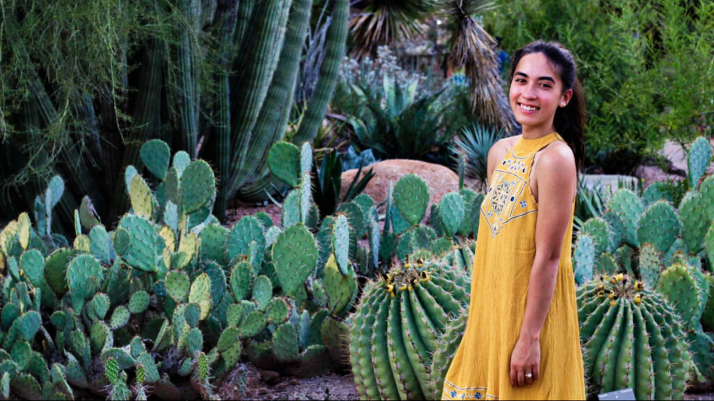 Travel Lemming Editor Abigail posing at the cacti garden