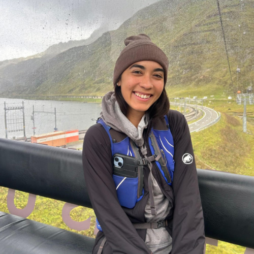 The author Abigail Bliss, sitting inside a cable car