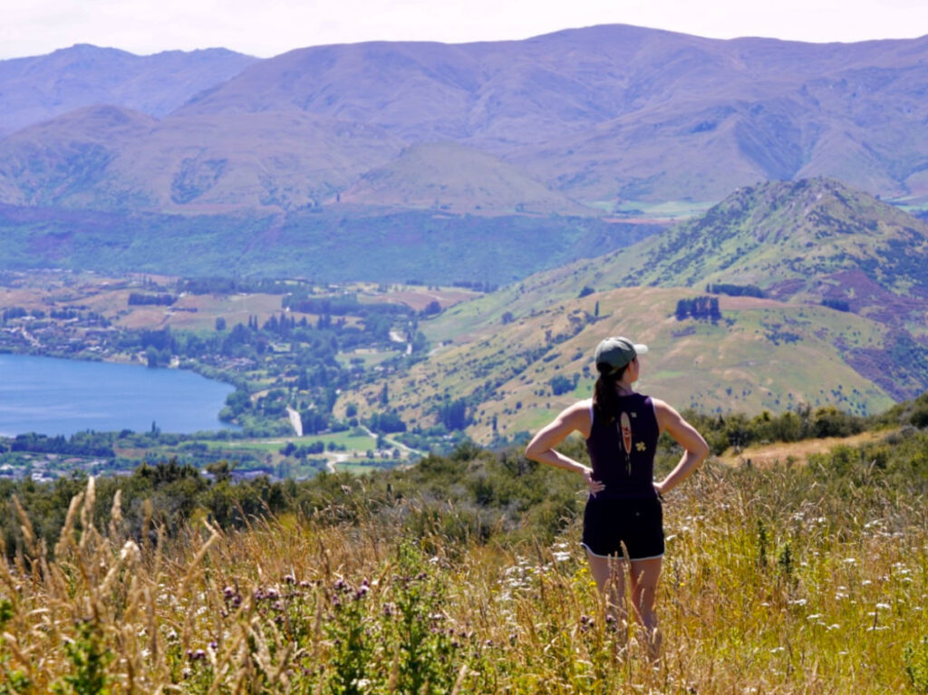 Author Betty admiring the views at the access road up to the ski valley trail