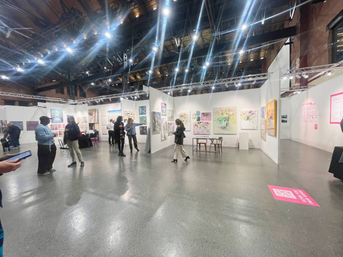 People looking around the Affordable Art Fair at the SoWa Power Station