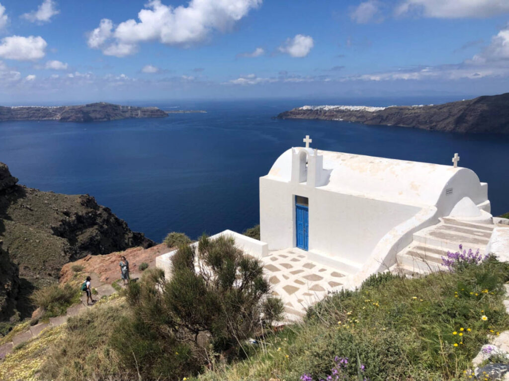 Overlooking view of the Agios Ioannis Chapel with Oia and Therasia views