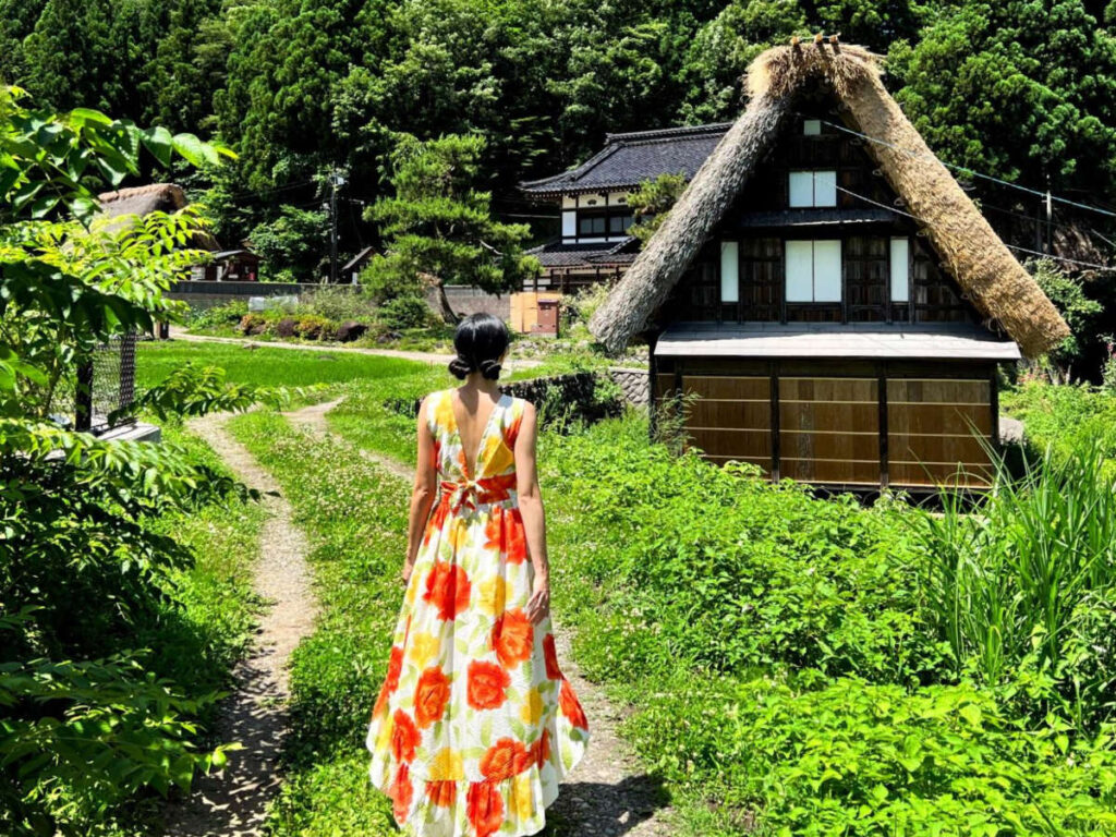 Author Lia walking around Ainokura Gassho Zukuri in Gokayama