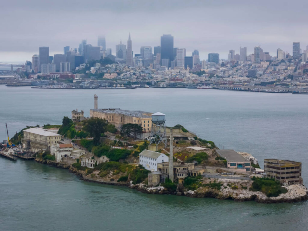 Aerial view of the Alcatraz Island and the downtown San Francisco skyline in the background