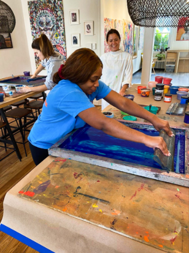 The author Alexandria on a screen printing class