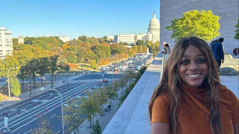 The author Alexandria standing on the rooftop of the National Gallery of Art