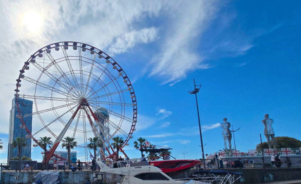 Panoramic view of the Ali and Nino Statues near the Ferris Wheel