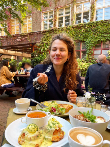 The author Amber Visch, dining at the alfresco of House of Small Wonder in 2021