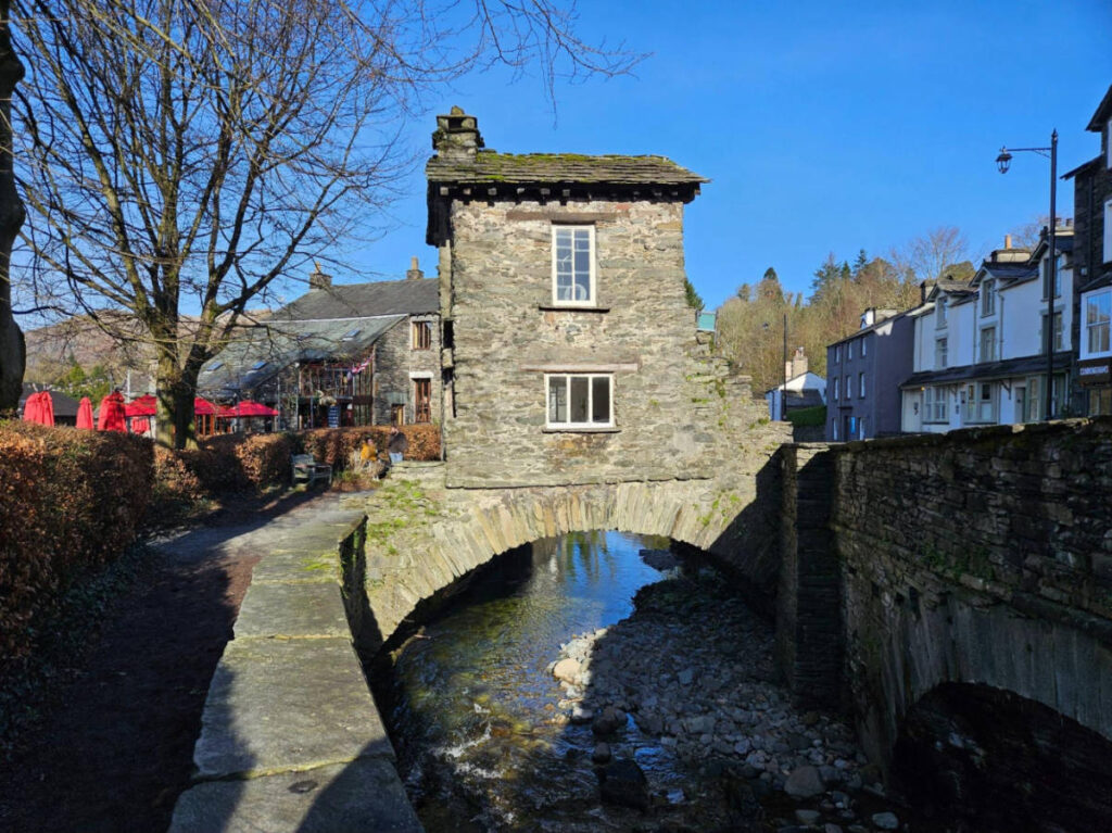 View of the historic stone Bridge House in Ambleside