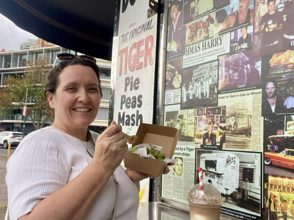 The author Ann-Marie Cahill, eating at the Harry’s Cafe de Wheels