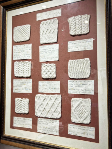 A board with a variety of Aran stitch patterns and their symbolism