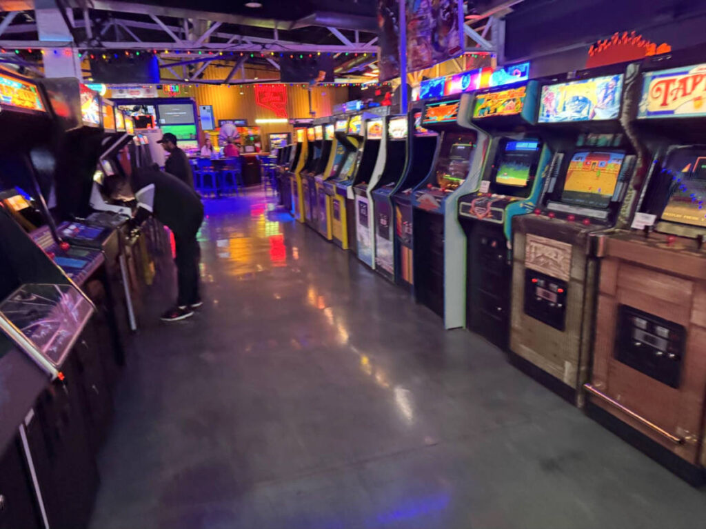 People playing the arcade games at Game Terminal