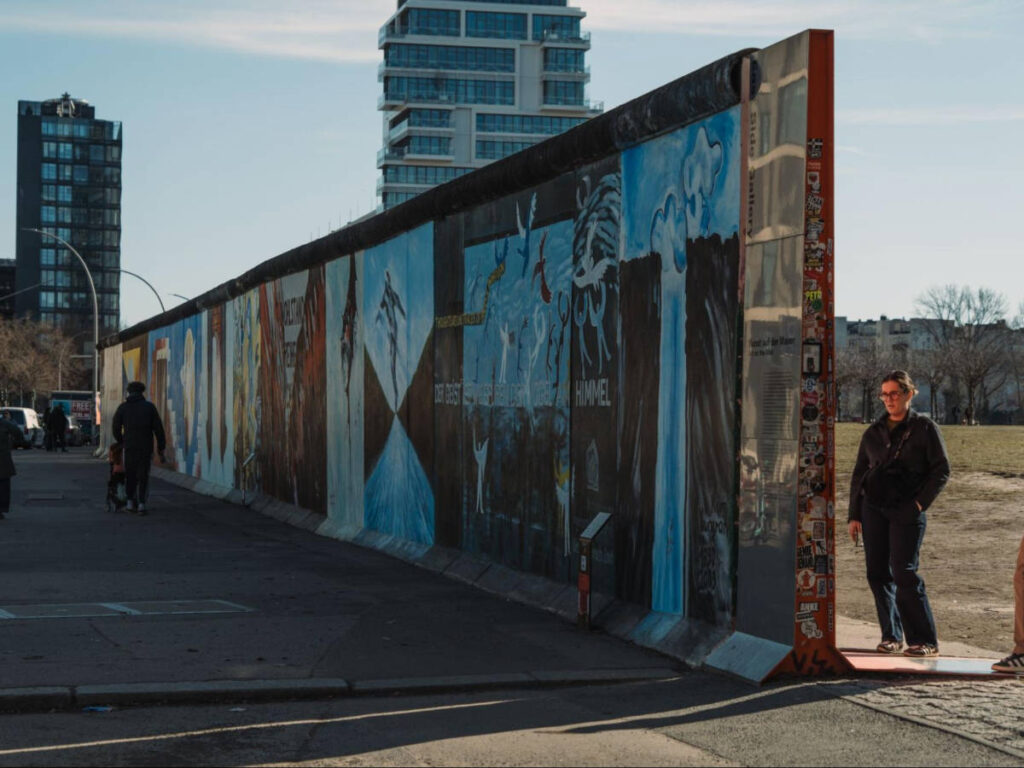 A gallery wall of artworks in East Side Gallery