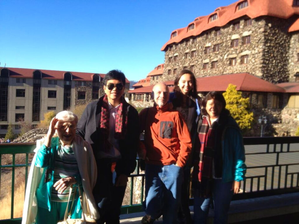Author Lea Rose Allbaugh and family taking Tem, an exchange student from Thailand to Asheville’s Grove Park Inn