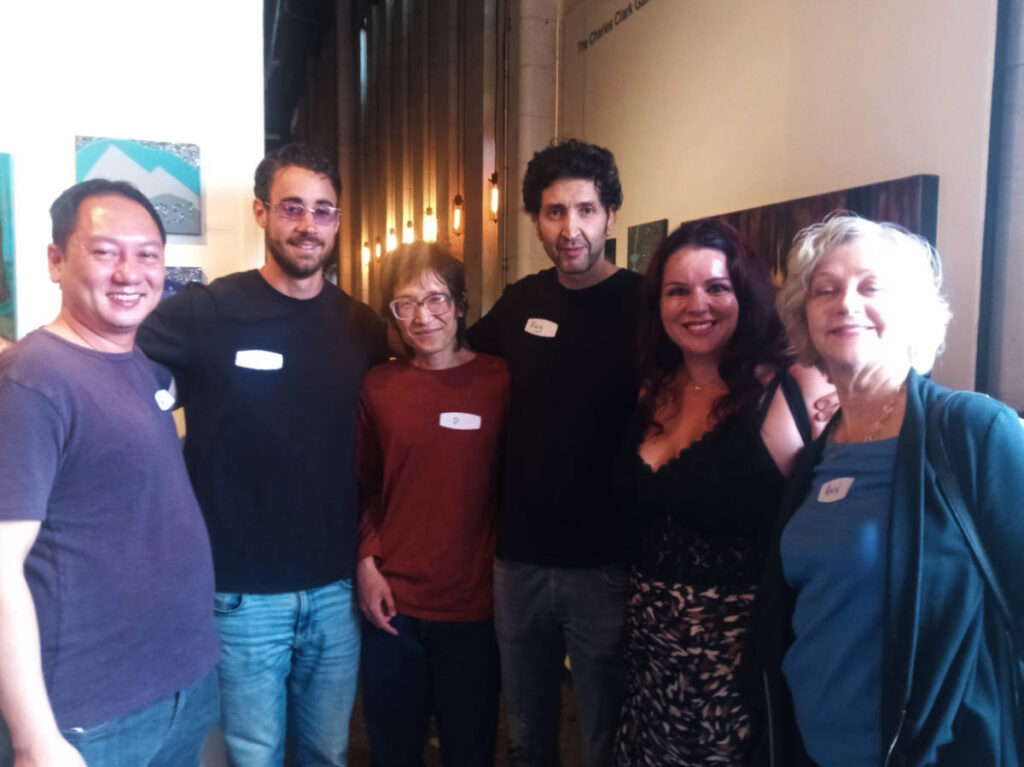 People smiling for a photo at the Vancouver Community Meetup
