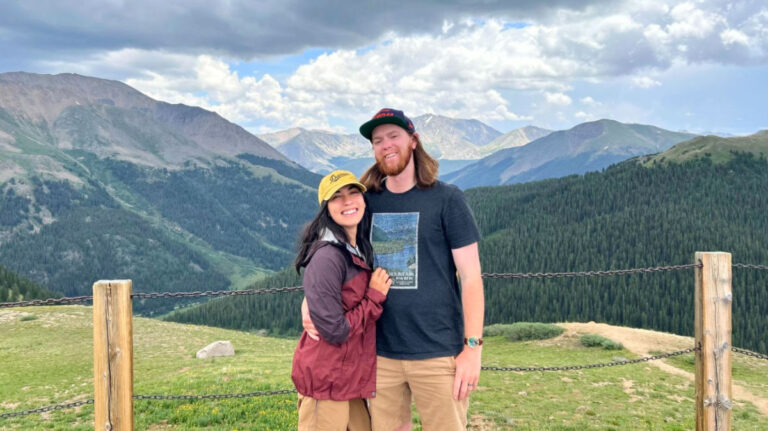 Travel Lemming editor Abigail and her husband with a view of Independence Pass in the background