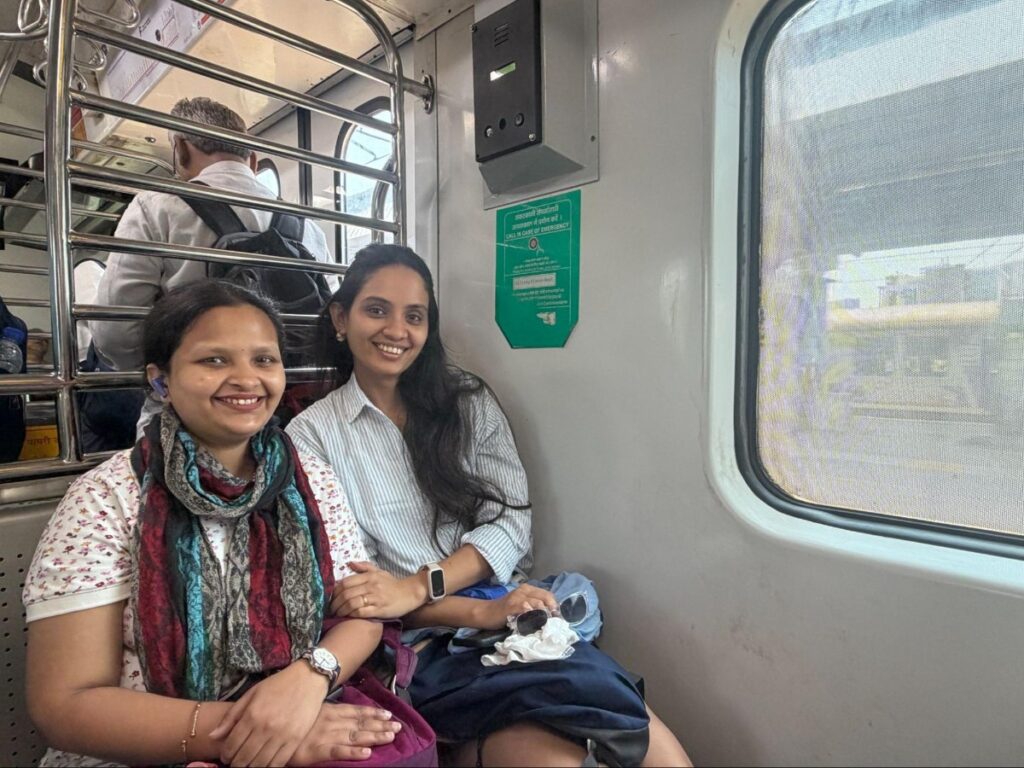 Author Advaita and her sister-in-law riding an air-conditioned local train heading towards South Mumbai