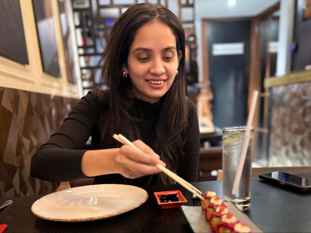 Author Advaita enjoying some sushi at Red Turtle