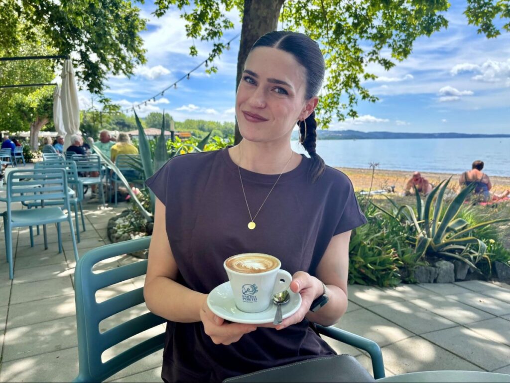 Author Betty enjoying a Cappuccino near Lake Bolsena