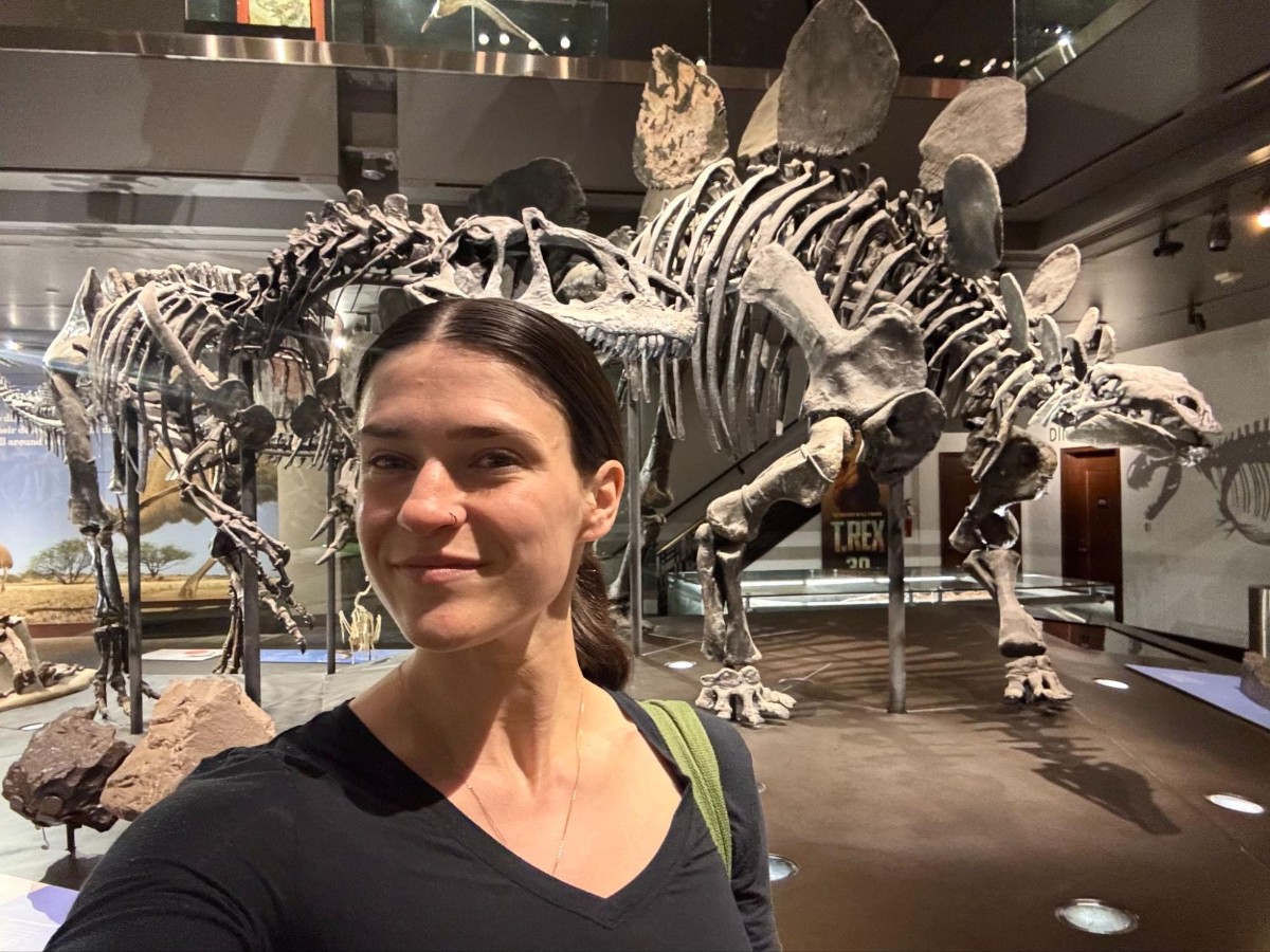Author Betty and the Stegosaurus skeleton at the Natural History Museum