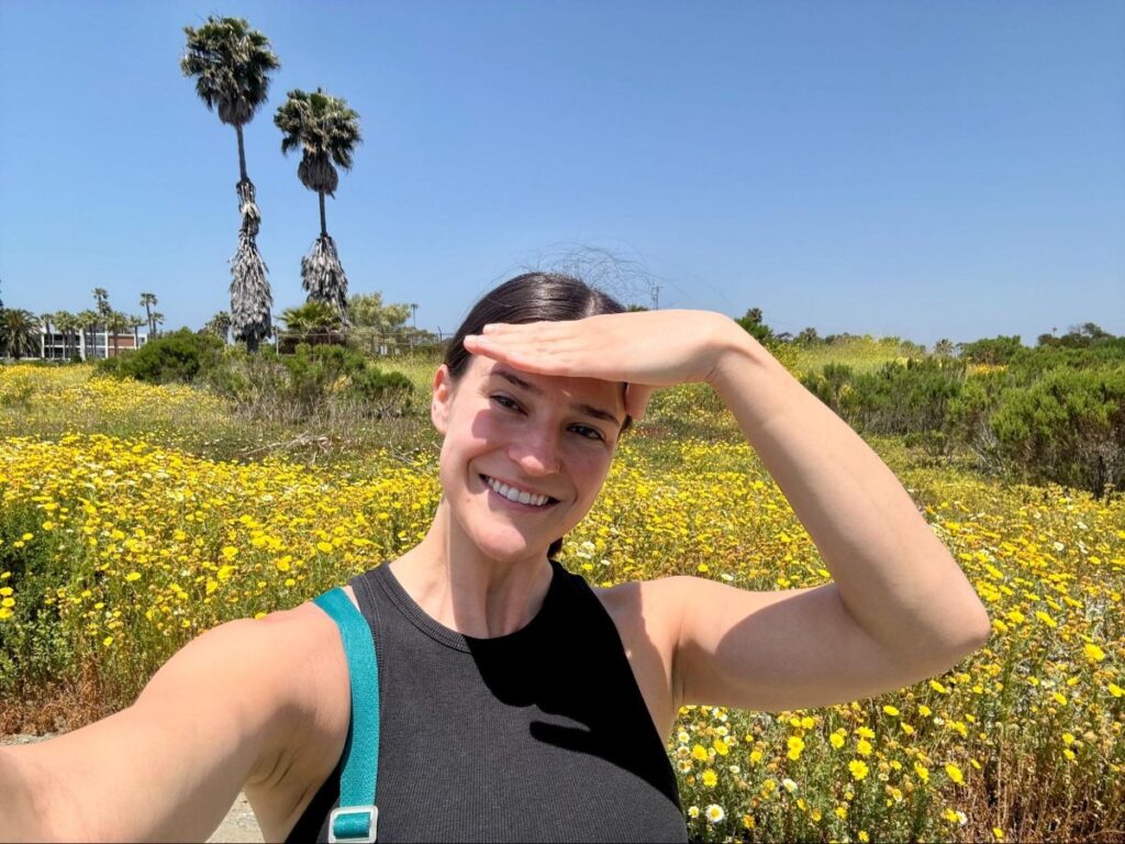 Author Betty taking a selfie on a sunny day at Ballona Wetlands Ecological Reserve