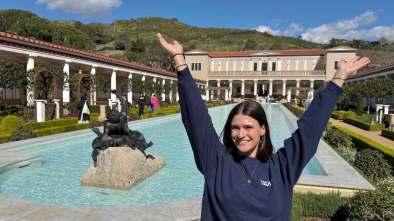 Author Betty at the reflection pool of Getty Villa in Los Angeles