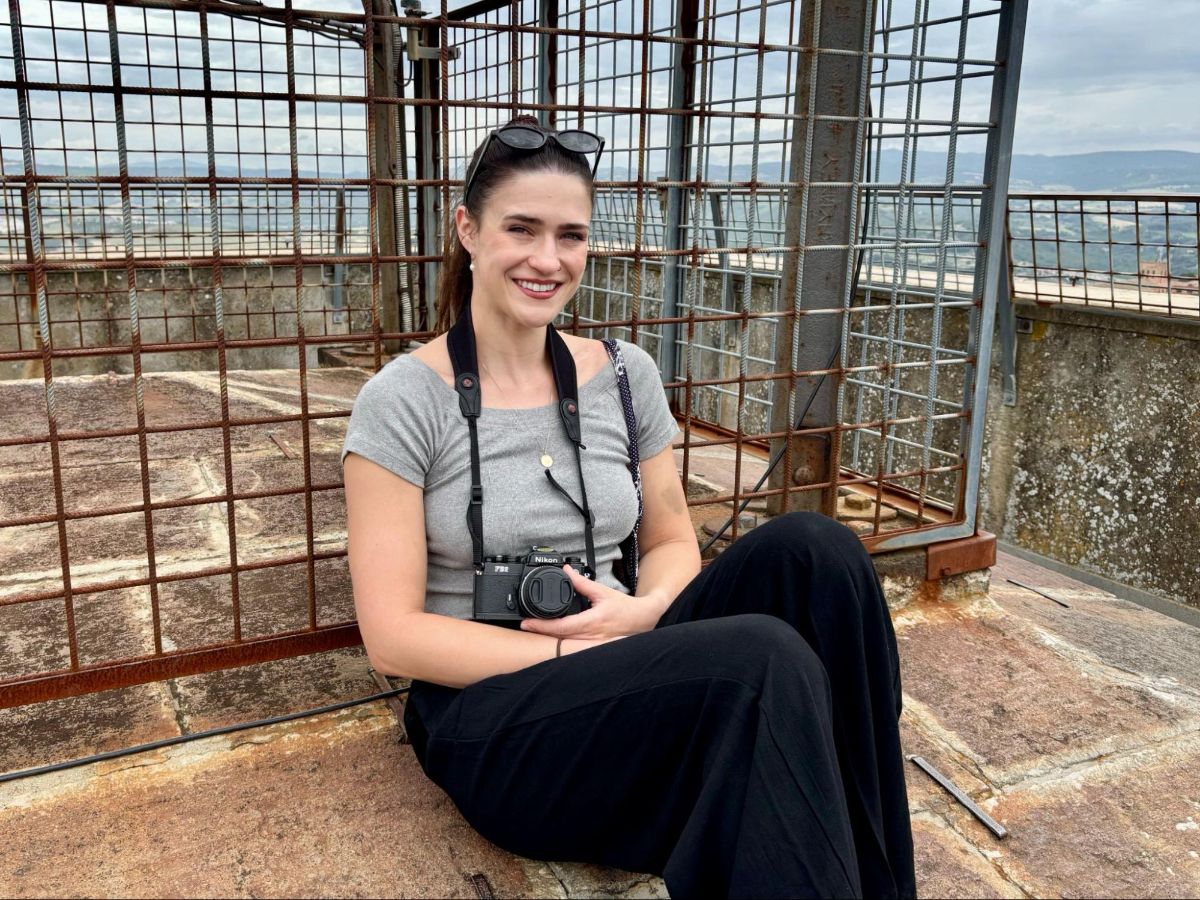 Author Betty resting atop the clock tower