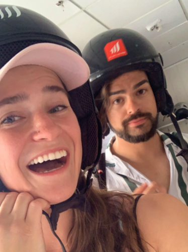 Author Betty wearing a helmet selfie with a friend