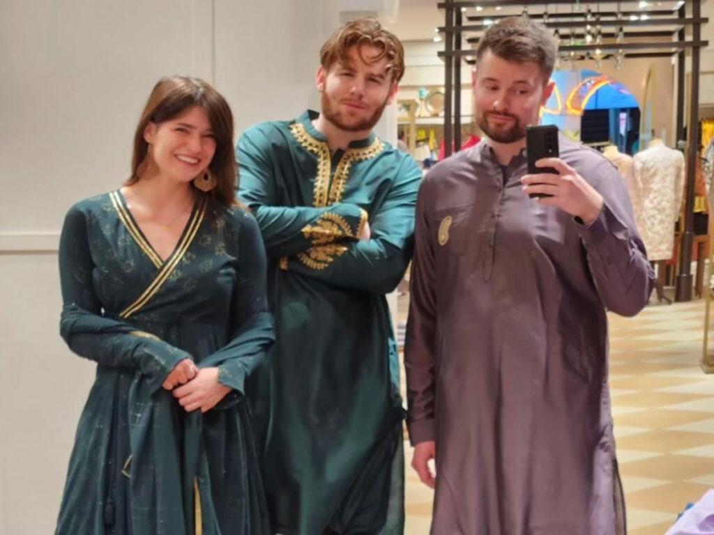 Author Betty and her family trying out some kurtas at the mall