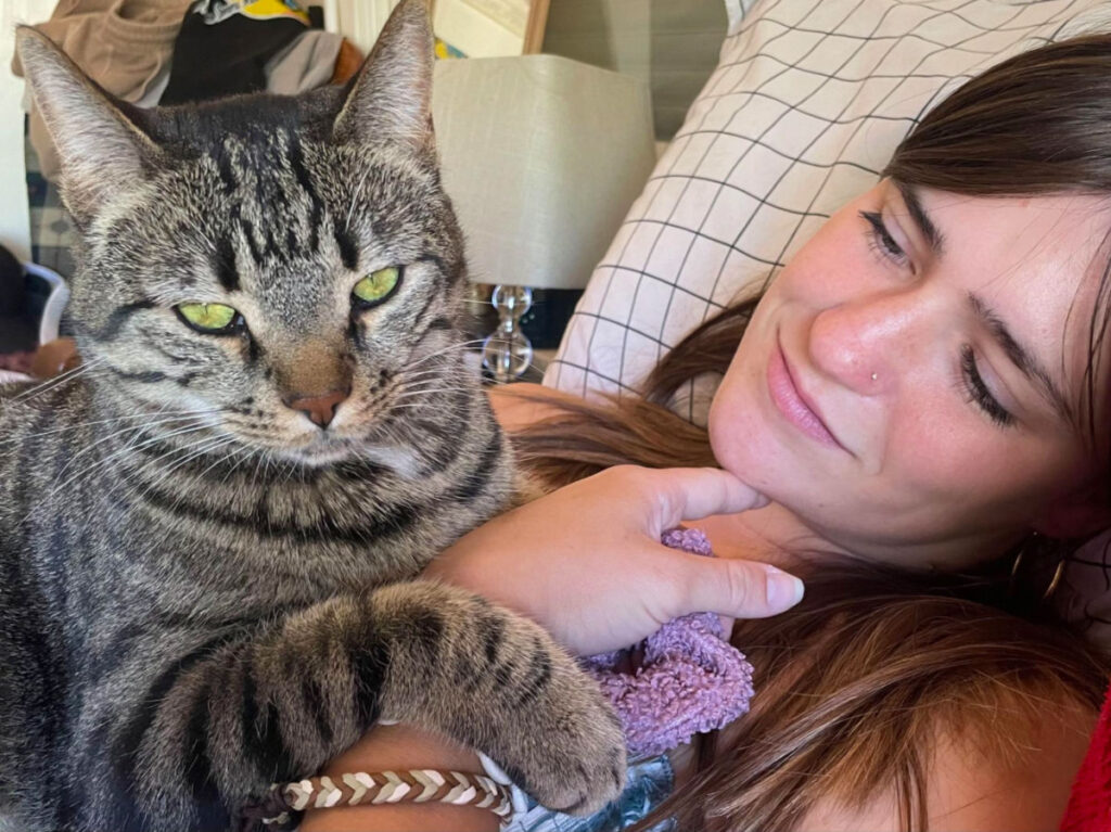 Author Betty with her grey cat