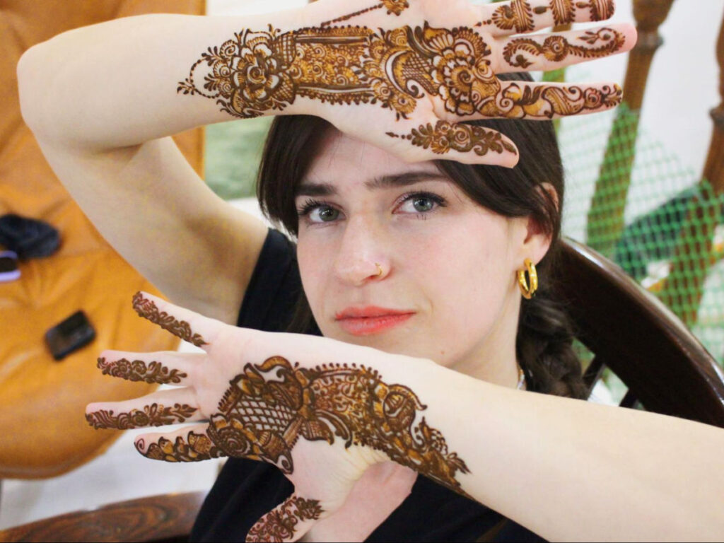 Author Betty showing off her wedding tattoos