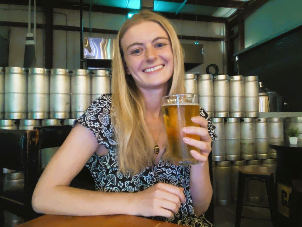 Author Brianna enjoying a tasty green apple ale at Mountain Star Brewing Company