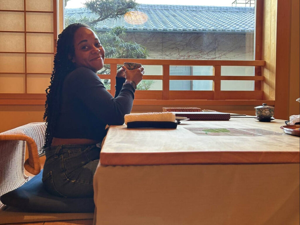 Author Chelsea enjoying a tea at a Ryokan room