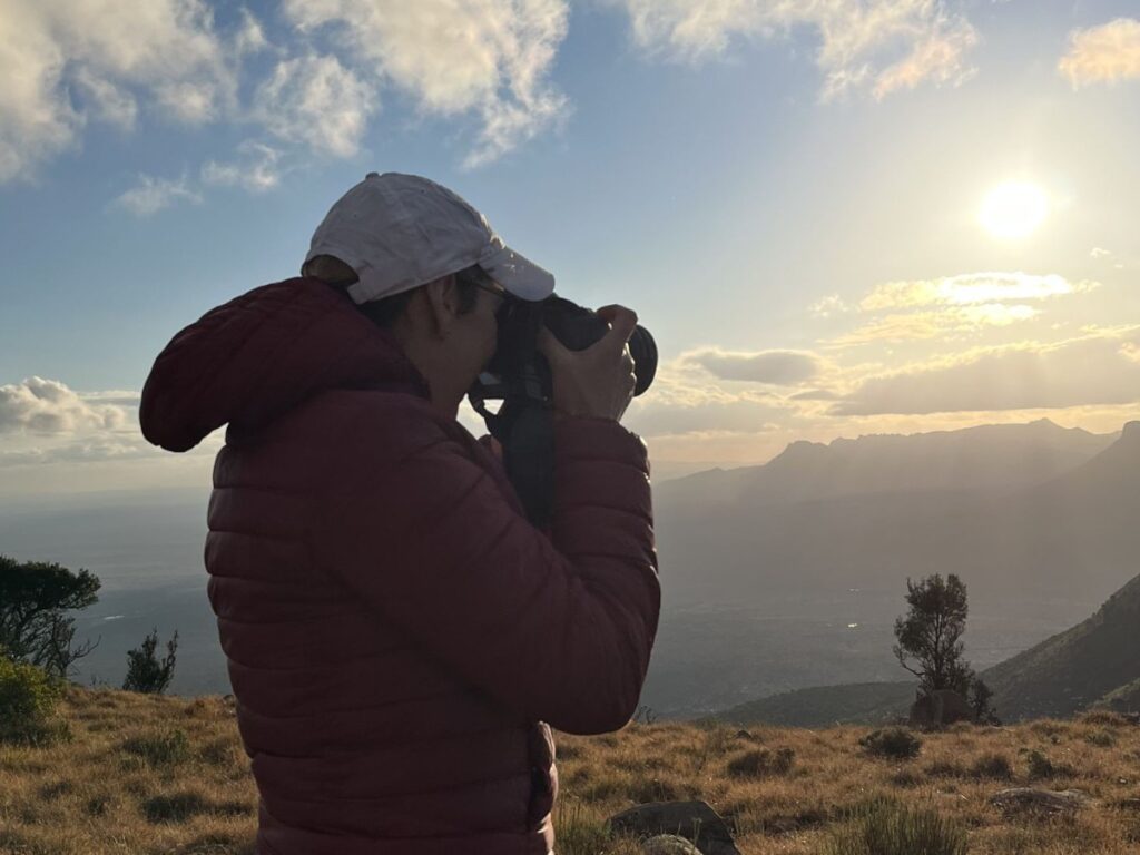 Author Elise taking a photo at Samara Game Reserve