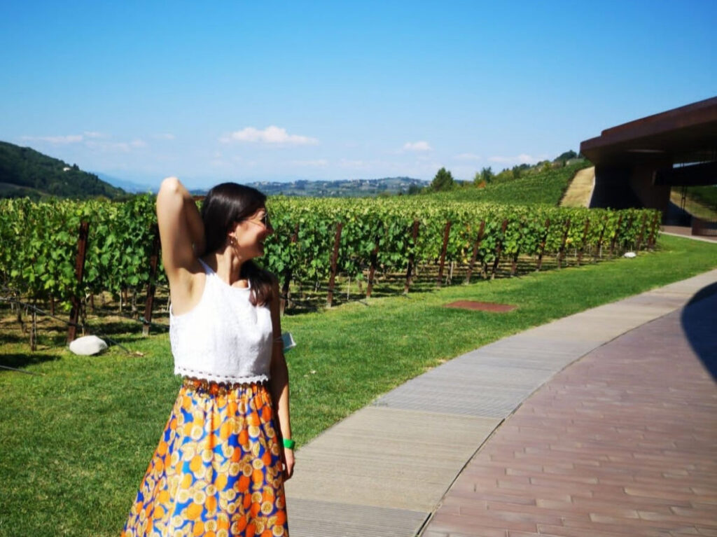 Author Giorgia standing at the walkway of Antinori’s Wine Cellar