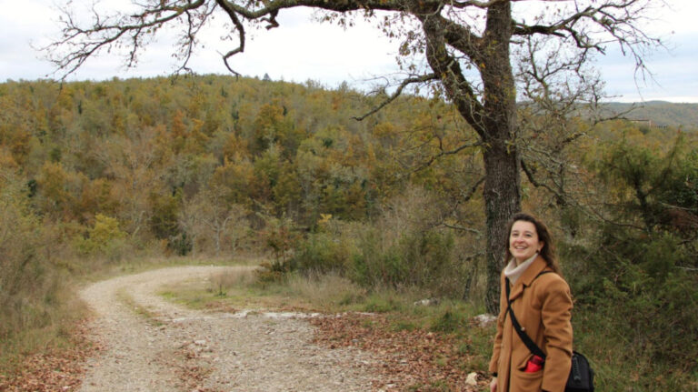 Author Giorgia standing at the surroundings of Meleto’s Castle, Gaiole in Chianti