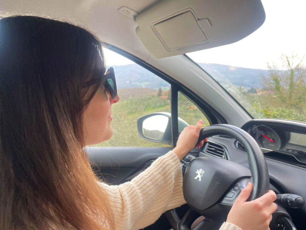 Author Giorgia driving in Tuscany