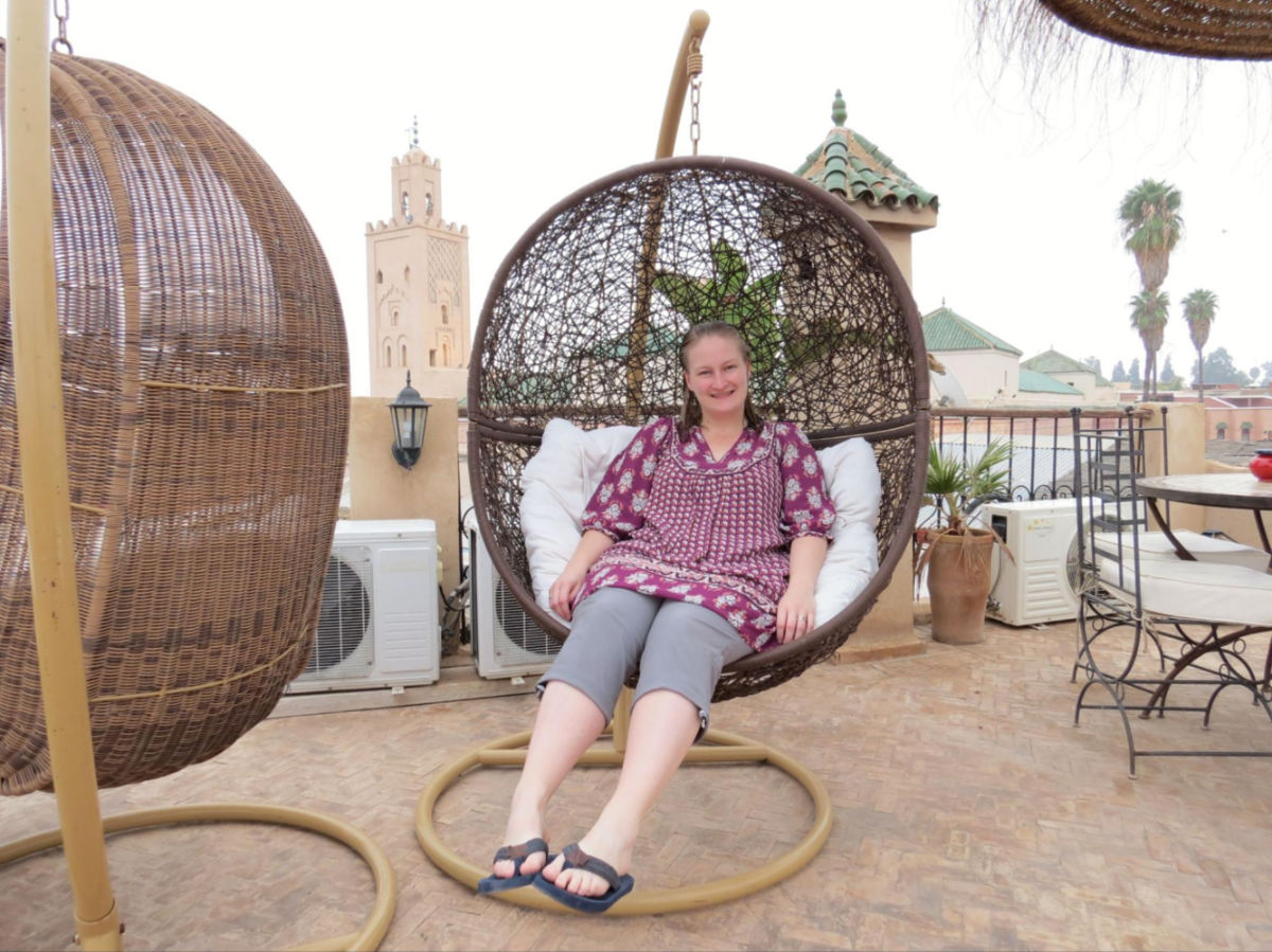 Author Heather relaxing at the roof terrace of Riad Mur Akush