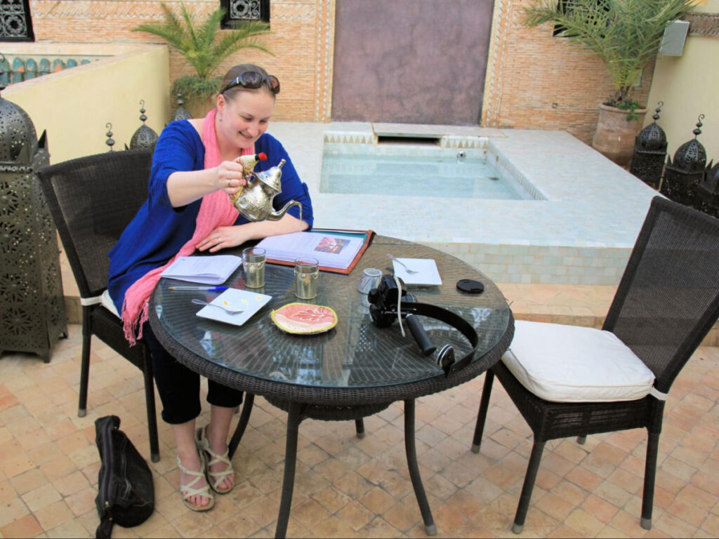 Author Heather enjoying a Mint tea on the roof terrace at Riad Assakina