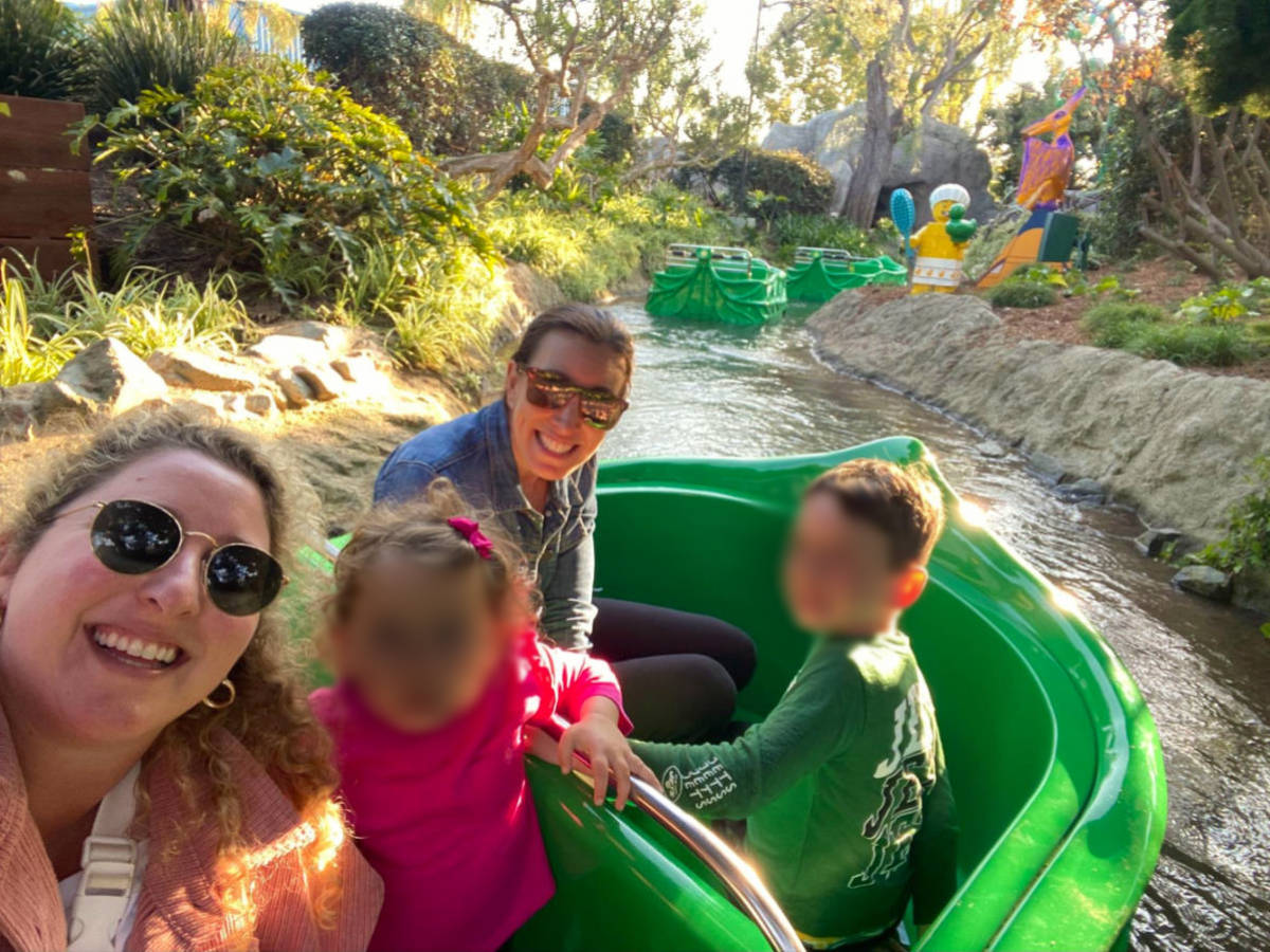 Author Jess and her family on the Fairy Tale Brook ride at Legoland